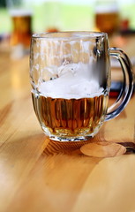 beer in a glass sitting on a table no people stock photo