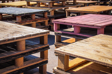 Outdoor furniture made of wooden palettes in cafe