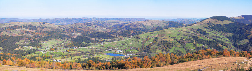 Carpatian village at mountains at the sunny day