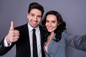 Self-portrait of his he her she nice attractive lovely stylish imposing cheerful cheery glad content partners embracing showing thumbup ad advert decision isolated over gray pastel background