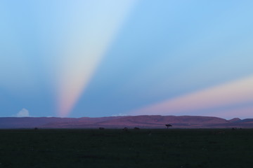 Light in the sky during sunset, Masai Mara National Park, Kenya.
