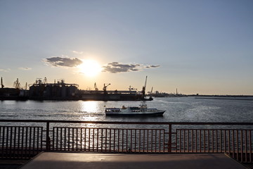Sunset in the port of Odessa. Night views of piers and ships. Summer 2019.