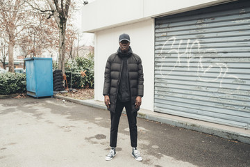 young african man standing in the street