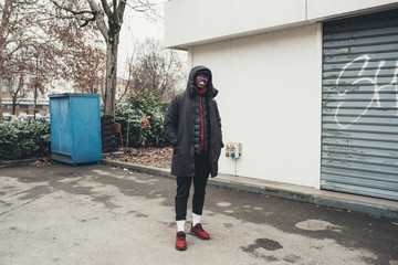 young bearded african man outdoors posing