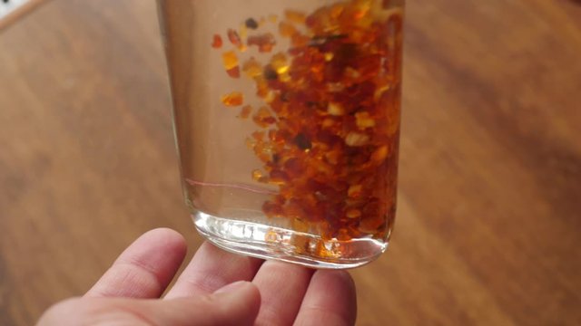 tincture of amber, pieces of amber in a bottle 