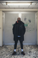 young african man posing looking camera