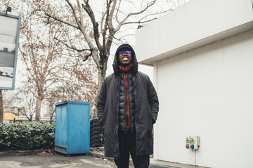 young bearded african man outdoors posing