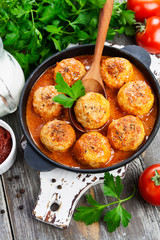 Meatballs in creamy tomato sauce