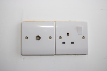Typical UK British white power plug. sockets