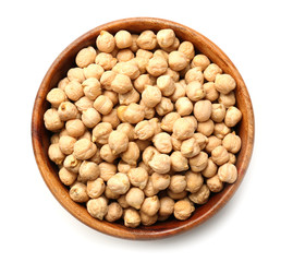 Bowl with raw chickpea on white background