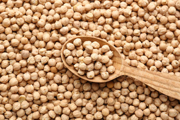 Spoon on many raw chickpea