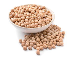 Bowl with raw chickpea on white background