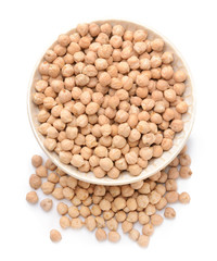 Bowl with raw chickpea on white background