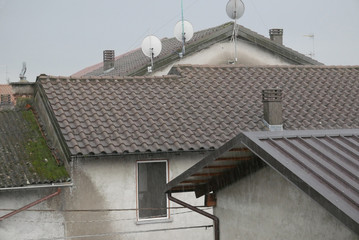 rain over the roofs in Italian Village