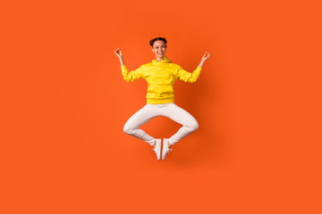 Full size photo of cheerful pretty lady doing exercise meditating showing om sign wear hood...