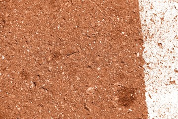 Old dirty asphalt surface with white paint on it brown color toned