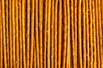 Salty bread sticks background pattern - obrazy, fototapety, plakaty