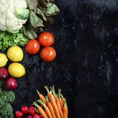 Fresh Veggies display on a black slate background