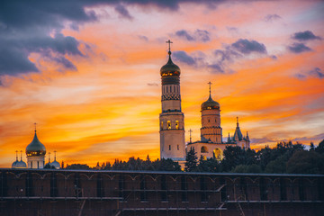 Naklejka premium Ivan Great Bell Tower of the Moscow Kremlin on sunset, Russian Federation