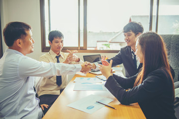 Fototapeta premium Business partners handshaking after signing contract Business teamwork Concept