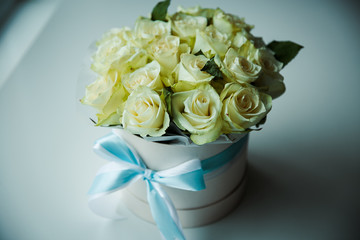 flowers on a white table with sweets