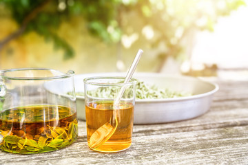 verbena tea on old wooden planks