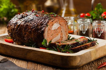 Roasted whole, stuffed with minced pork neck.