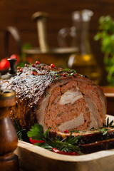 Roasted whole, stuffed with minced pork neck.
