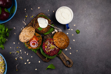 Obraz na płótnie Canvas Vege burgers with carrots, beetroots and mushrooms.