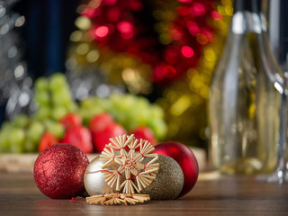 Christmas and New Year's theme still life, Decoration in foreground in focus, Blurred bokeh background.