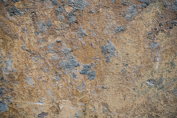 Texture of an old wall covered with paint. Background image of a worn paint coated surface
