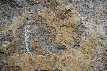 Texture of an old wall covered with paint. Background image of a worn paint coated surface