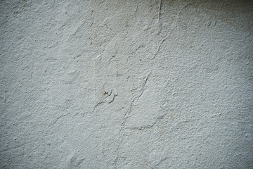 Texture of an old wall covered with paint. Background image of a worn paint coated surface