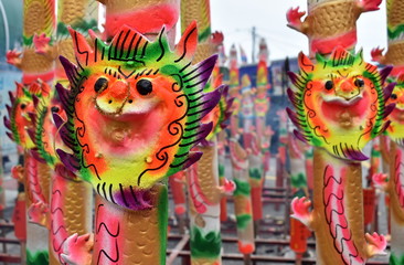 Colorful dragon face incense sticks ready for a Chinese festival