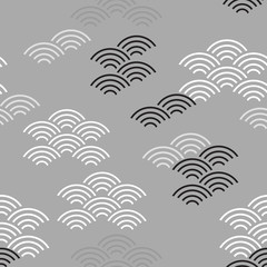 Fototapeta na wymiar Seigaiha literally means wave of the sea. seamless pattern abstract scales simple Nature background japanese circle Black white gray colors. Can be used for Gift wrap, fabrics, wallpapers. Vector