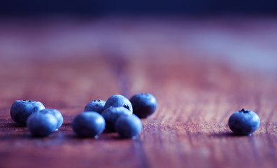 Close up on blueberries on wooden table