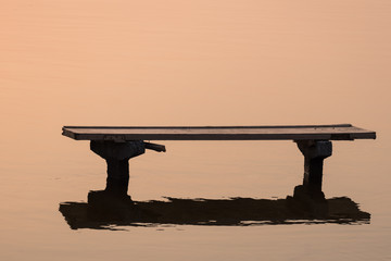 Bench in snset reflaction