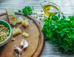  Ingredients for pesto sauce: green Basil, Parmesan cheese, olive oil, pine nuts, salt and garlic...