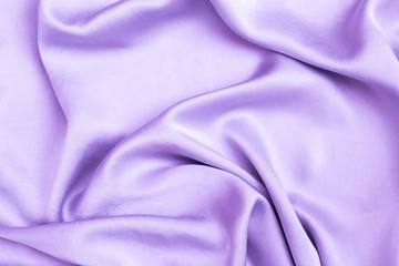 Abstract purple satin fabric texture background