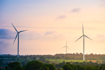 Green energy concept, eco power. Wind turbine located along the hill with the wind blowing all the time. Can produce renewable energy as well. Considered a clean energy.