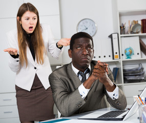 Upset man with angry boss