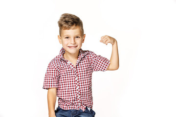 handsome boy shows his strength on white background