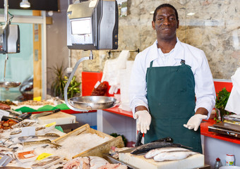 Salesman portrait in fish shop