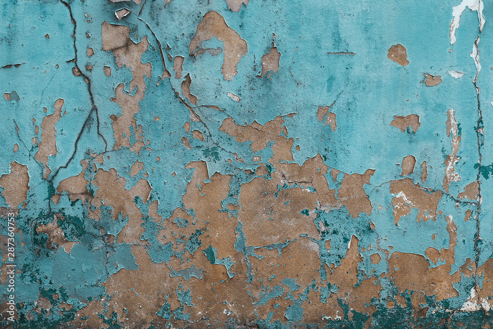 Poster old and worn out wall background with paint peeling off , grunge texture of building in a state of d