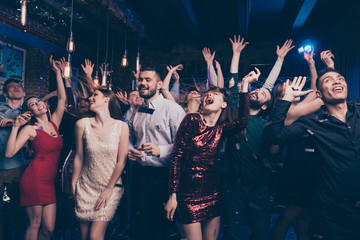Portrait of charming attractive millennial motion having scream shout rejoice raise hands free time indoors discotheque dress suit formalwear hairstyle - obrazy, fototapety, plakaty
