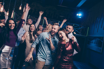 Portrait of cute charming feel funky funny person people move movement dance floor content cheerful rejoice indoors disco discotheque wear shirt dress trousers