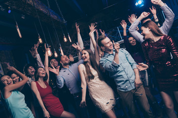 Nice attractive glamorous stylish cheerful positive girls and guys having fun free time chill out bachelor graduate lifestyle feast amusement event celebratory in luxury place nightclub indoors