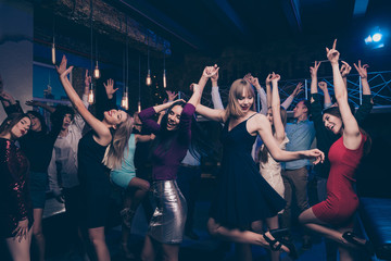 Nice gorgeous attractive smart glamorous slim fit cheerful positive stylish girls and guys having fun solemn festive festal lifestyle occasion celebratory in fashionable luxury place nightclub indoors