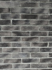 Gray brick wall. Construction material texture.
