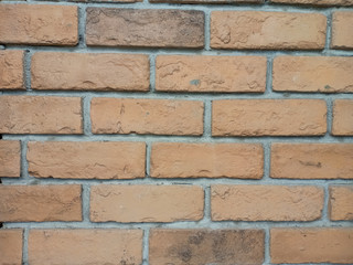 Orange brick wall. Construction material texture.